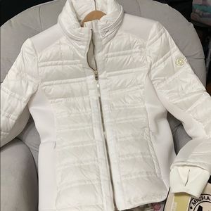 This is a beautiful white Michael Kors jacket.